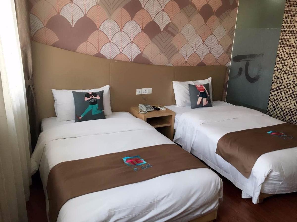 Pai Hotel Heze Dingtao Wantai City Exterior foto