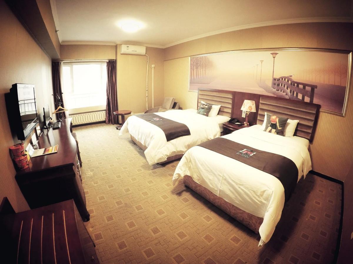 Pai Hotel Heze Dingtao Wantai City Exterior foto